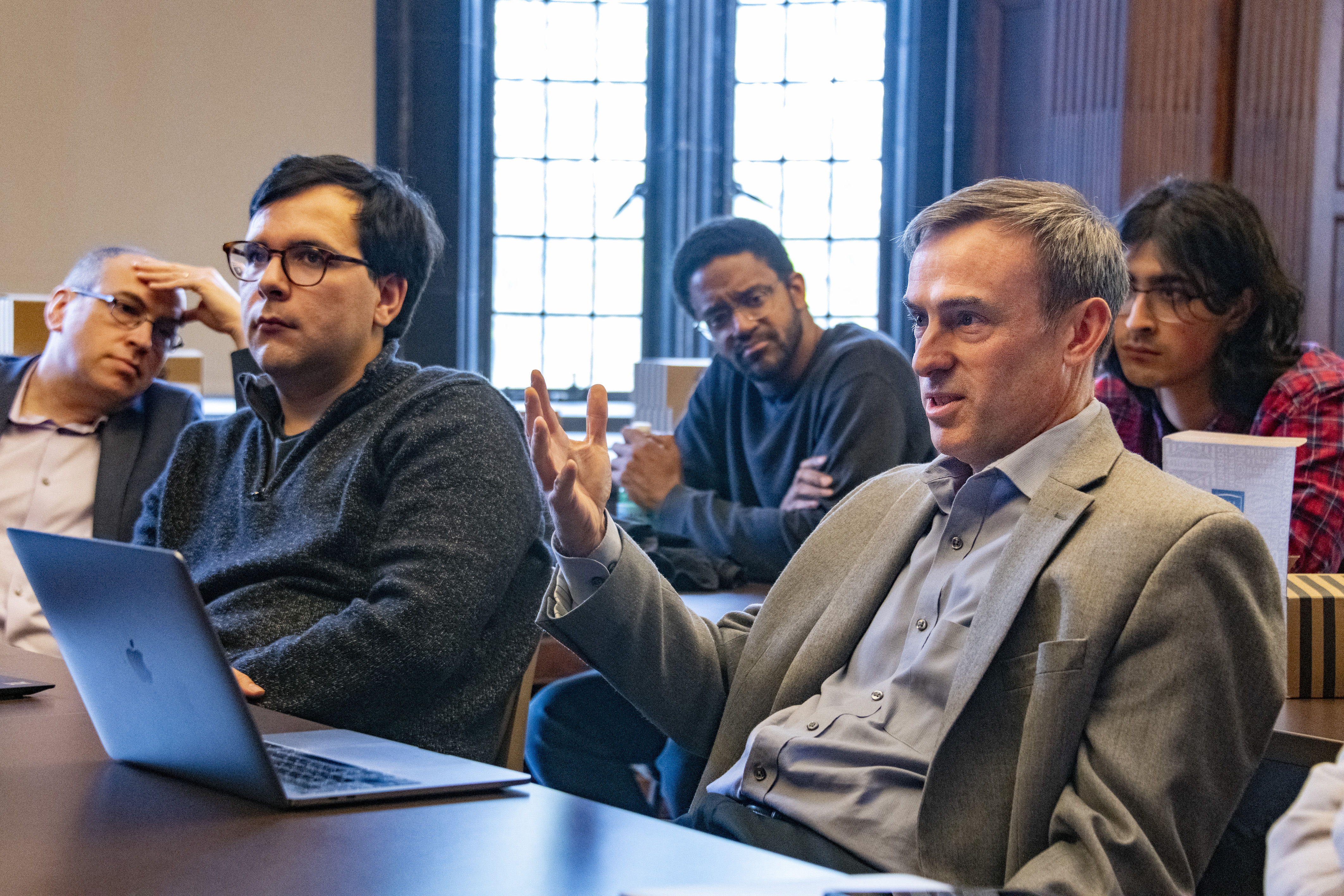 Group of people listening in room